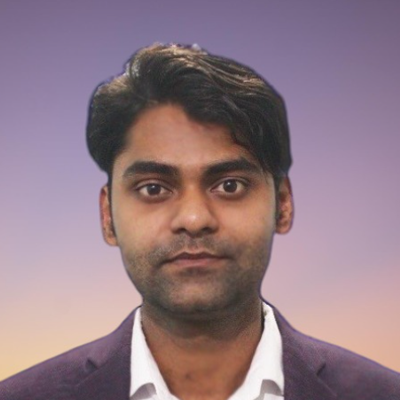 Mohd Adnan, IST PhD student at Mason, wears a purple suit and white shirt in his profile.