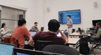 group of students brainstorming in a room